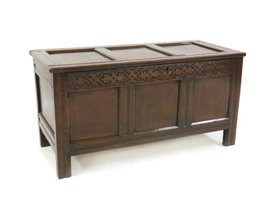 Lot 437 - An oak coffer