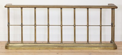 Lot 180 - A brass club fender