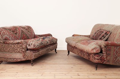 Lot 36 - A pair of kilim-upholstered sofas