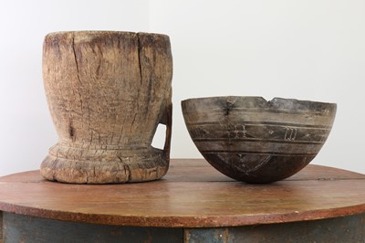 Lot 63 - A tribal dugout wooden mortar