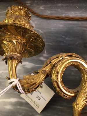 Lot 33 - A George III ormolu three-light candelabrum