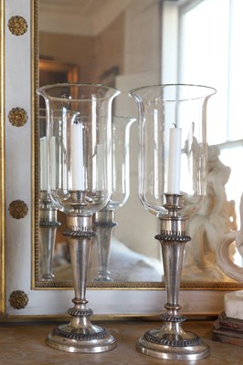 Lot 85 - A pair of George III old Sheffield plate storm candlesticks