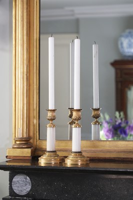 Lot 114 - A pair of Directoire Carrara marble and ormolu candlesticks