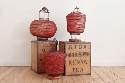 Lot 424 - A Chinese wirework and red paper globe lantern