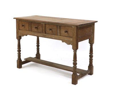 Lot 377 - A limed oak side table