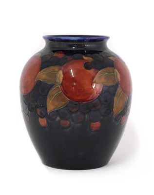 Lot 86 - A William Moorcroft pottery ‘Pomegranate’ pattern vase