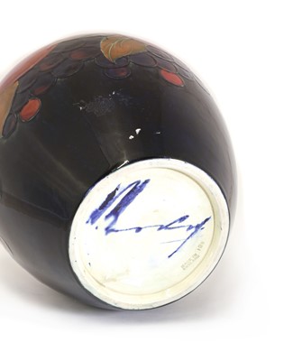 Lot 86 - A William Moorcroft pottery ‘Pomegranate’ pattern vase