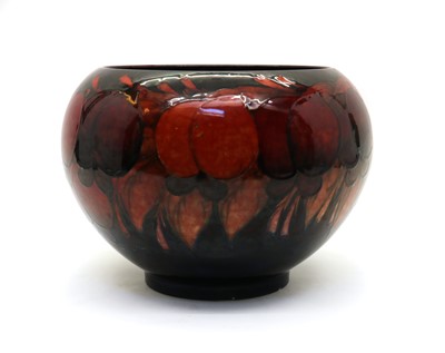 Lot 60 - A William Moorcroft pottery Flambe ‘Wisteria’ pattern vase