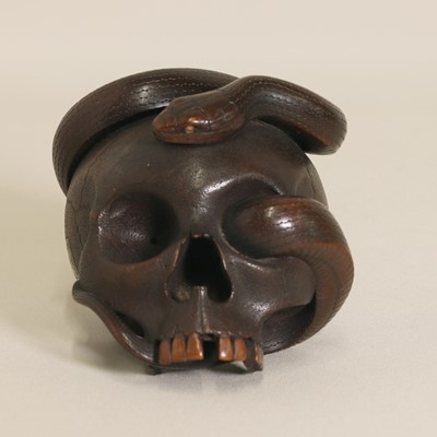 Lot 227 - A Japanese wood okimono
