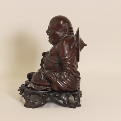 Lot 108 - A Chinese wood budai
