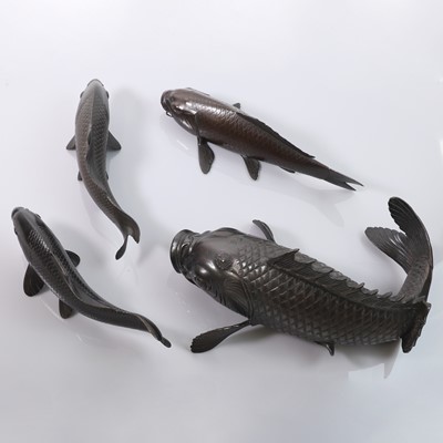 Lot 210 - A collection of four Japanese bronze okimono