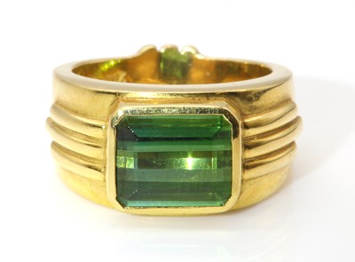 Lot 286 - A gold single stone green tourmaline ring, by Astral Gemstone Talismans