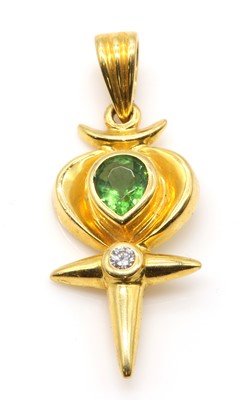 Lot 240 - A gold paste and diamond ankh cross pendant, by Astral Gemstone Talismans