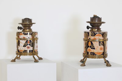 Lot 182 - A pair of Arts & Crafts/Aesthetic-style pottery oil lamps