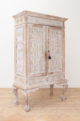 Lot 98 - A Dutch-style limed teak and rattan cabinet on stand