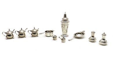 Lot 48 - A collection of silver condiment items