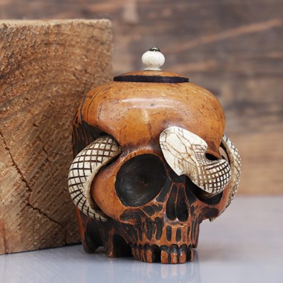 Lot 486 - A carved fruitwood vanitas inkwell