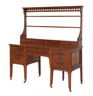 Lot 25 - A walnut dresser and rack