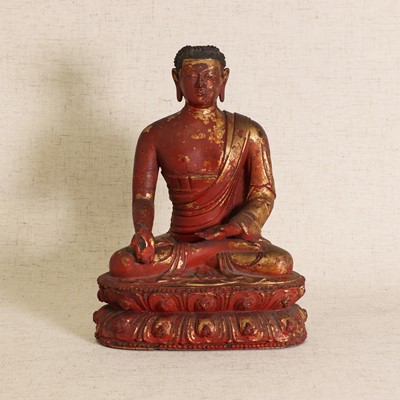 Lot 87 - A Chinese gilt lacquered wood Buddha