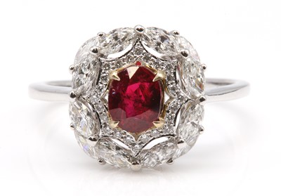 Lot 498 - An unheated Burmese ruby and diamond oval cluster ring