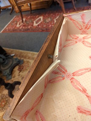 Lot 385 - A George III elm chest of drawers