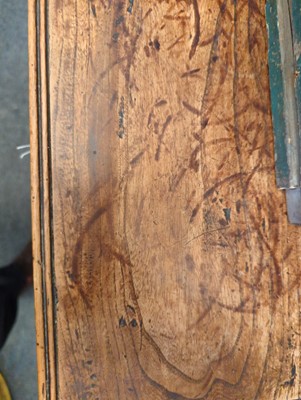 Lot 385 - A George III elm chest of drawers
