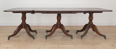 Lot 391 - A George III mahogany triple pedestal dining table
