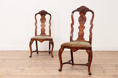 Lot 383 - A pair of walnut marquetry side chairs
