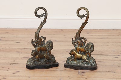 Lot 375 - A pair of cast brass doorstops