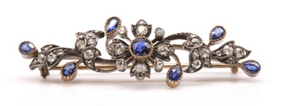 Lot 102 - A late Victorian sapphire and diamond spray bar brooch, c.1890