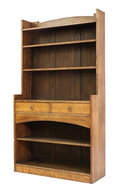Lot 64 - An Arts and Crafts oak open bookcase