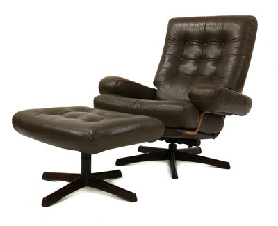 Lot 333 - A Swedish 'Dolphin' leather lounge chair and ottoman