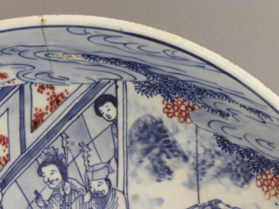 Lot 28 - A Chinese copper red and underglaze-blue charger