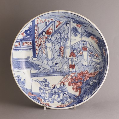Lot 28 - A Chinese copper red and underglaze-blue charger