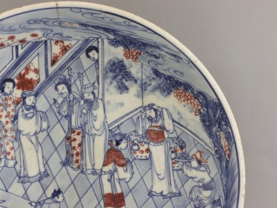Lot 28 - A Chinese copper red and underglaze-blue charger