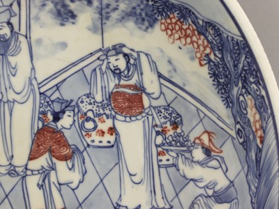 Lot 28 - A Chinese copper red and underglaze-blue charger