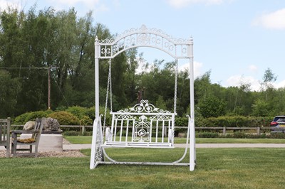 Lot 401 - A painted ironwork garden swing seat