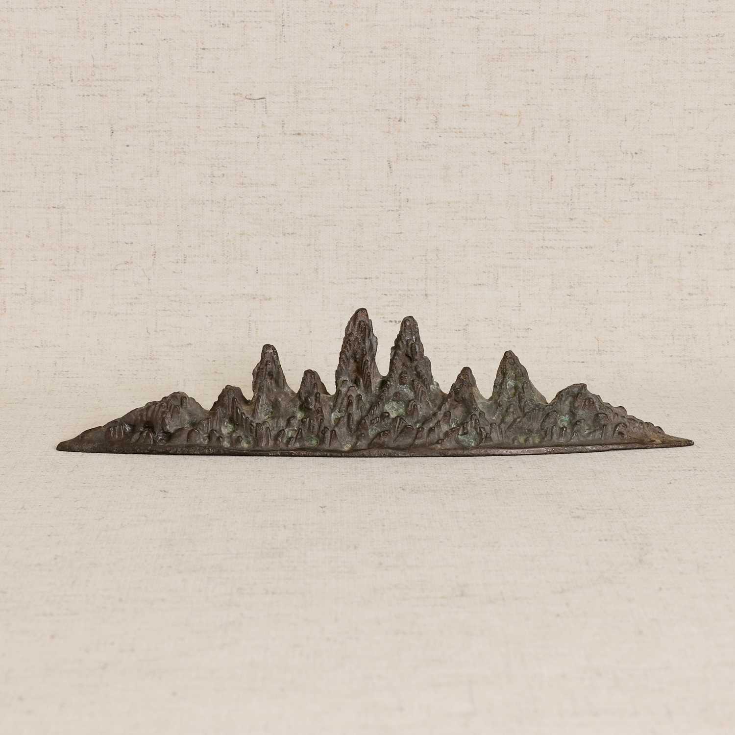 Lot 79 - A Chinese bronze brush rest