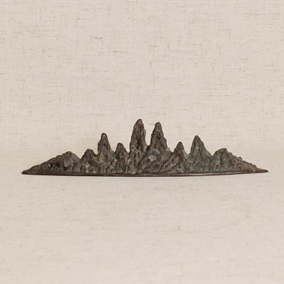 Lot 79 - A Chinese bronze brush rest