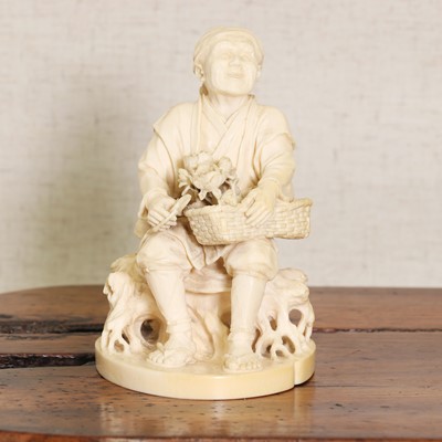 Lot 216 - A Japanese ivory okimono