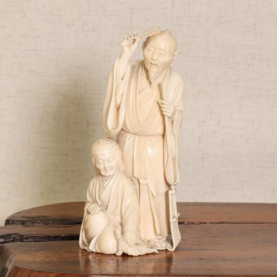 Lot 226 - A Japanese ivory okimono