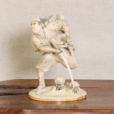 Lot 224 - A Japanese ivory okimono