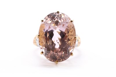 Lot 105 - A 9ct gold kunzite and diamond ring