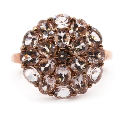 Lot 192 - A 9ct rose gold morganite cluster ring