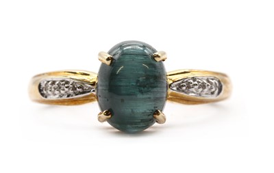 Lot 251 - A 9ct gold cat's eye tourmaline and diamond ring