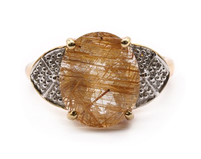 Lot 211 - A 9ct gold rutilated quartz and diamond ring