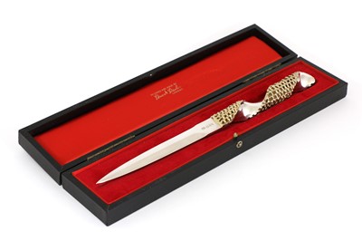 Lot 486 - A silver and gilt paper knife