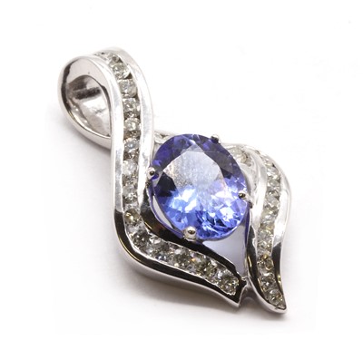 Lot 290 - An 18ct white gold tanzanite and diamond pendant