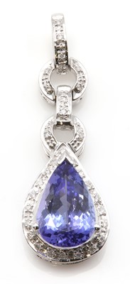 Lot 443 - An 18ct white gold tanzanite and diamond pendant