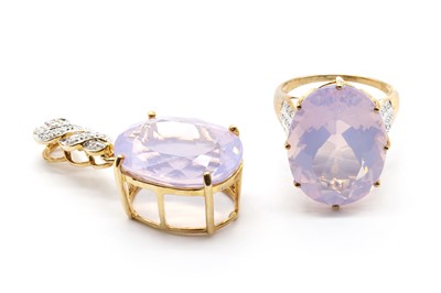 Lot 310 - A 9ct gold faceted rose quartz and diamond ring